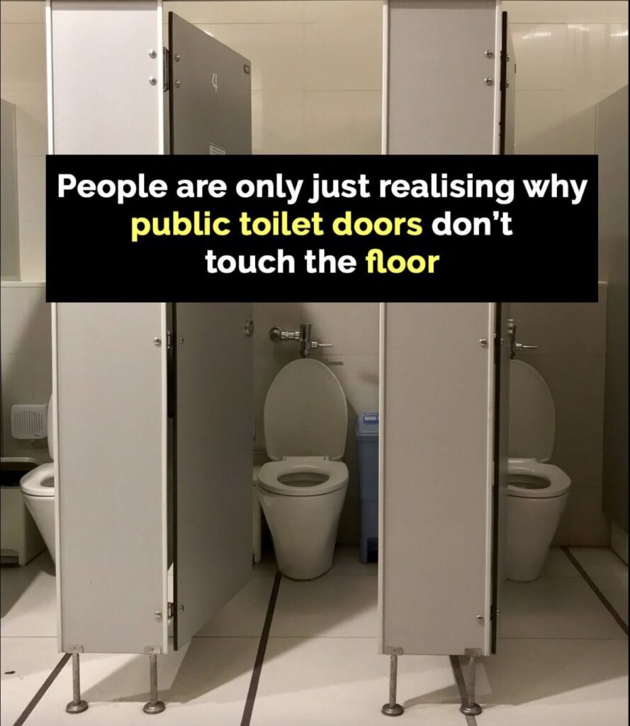 The reason doors in public bathrooms don’t touch the ground